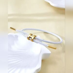 White Braided Bracelet with Gold “H” Charm